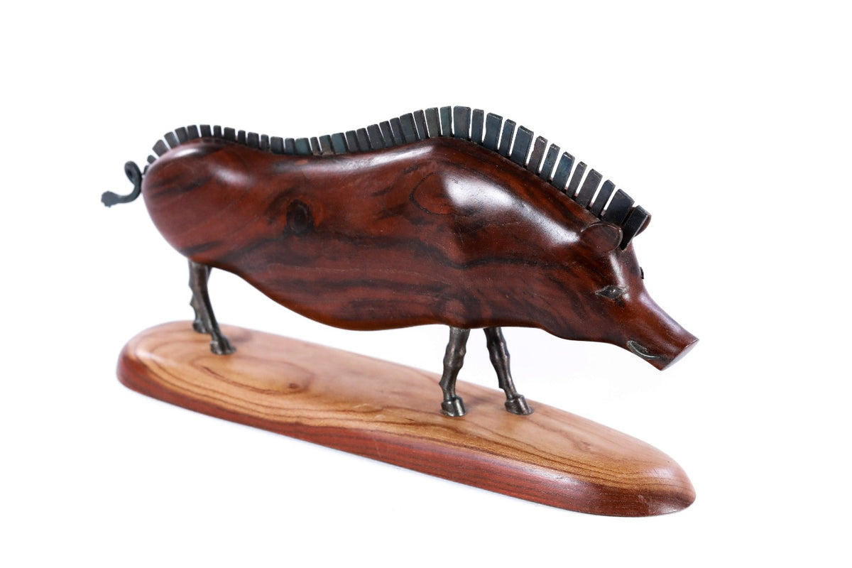 Wooden wild boar sculpture hand carved with metal pieces — detail view