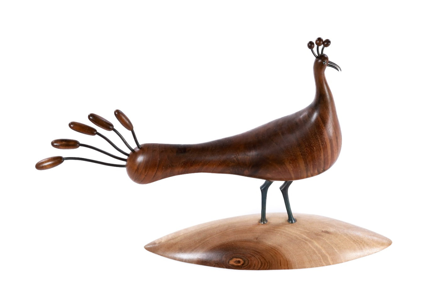 Wooden peacock sculpture, natural apricot grain detail