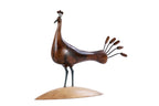 Handmade wooden peacock sculpture — carving detail