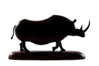 Hand-carved walnut rhinoceros sculpture, 11" / 28 cm — full view
