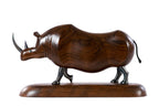 Walnut rhinoceros sculpture, natural grain detail