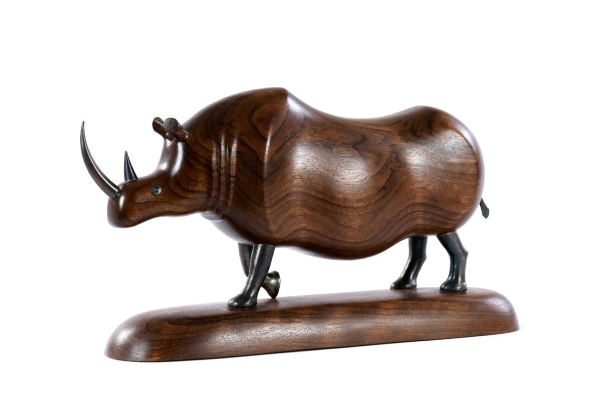 Handmade wooden rhinoceros sculpture — carving detail