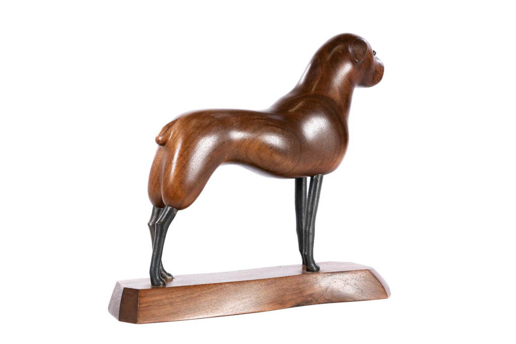 Walnut dog sculpture, natural grain detail