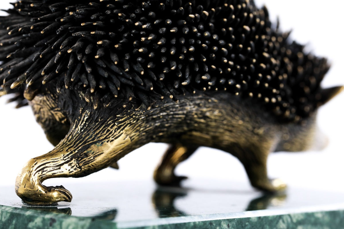 Bronze hedgehog sculpture — detail view