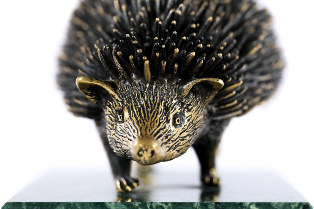 Bronze hedgehog sculpture — back view