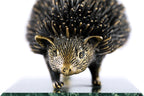 Bronze hedgehog sculpture — back view