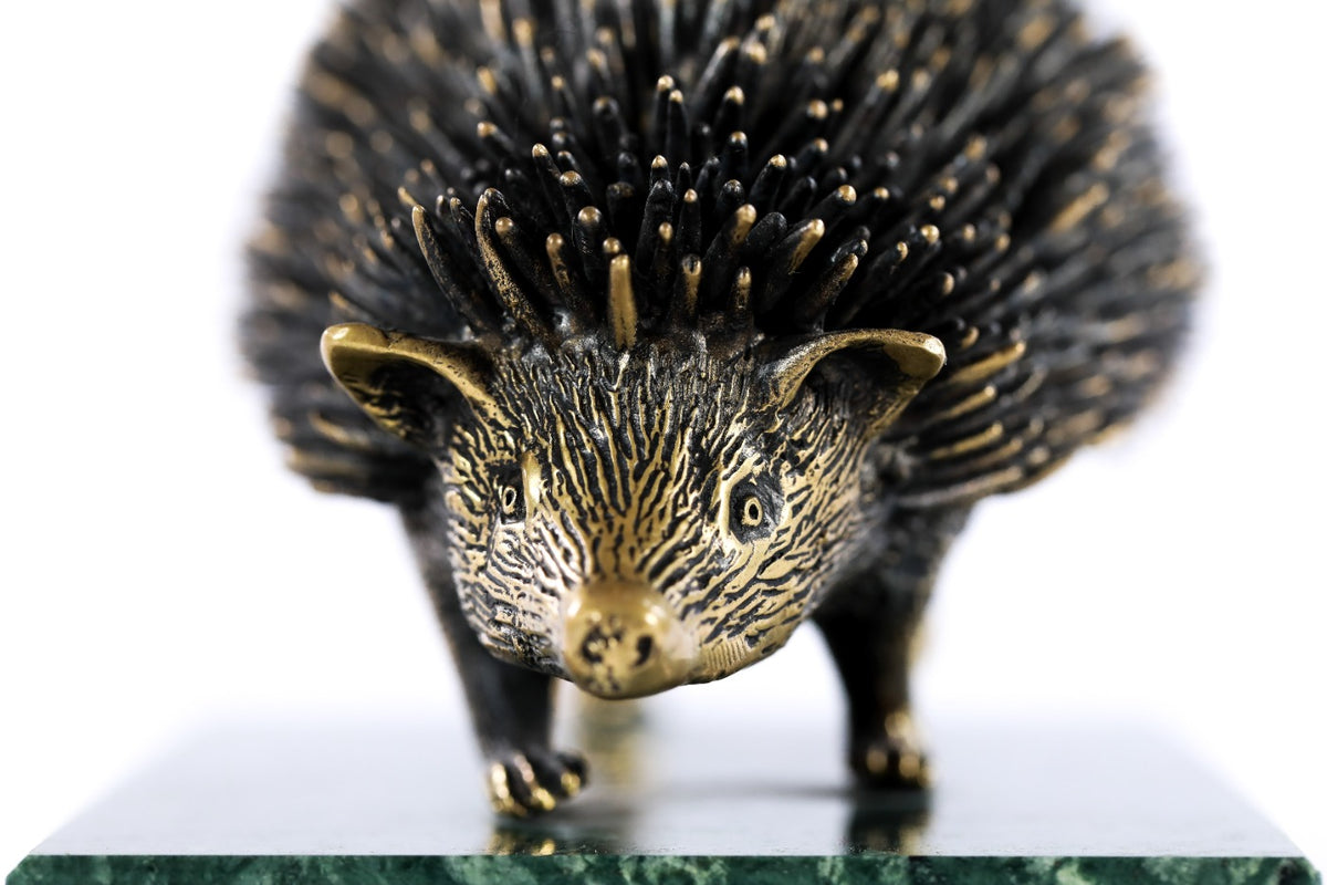 Bronze hedgehog sculpture — back view