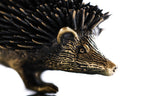 Bronze hedgehog sculpture — side view