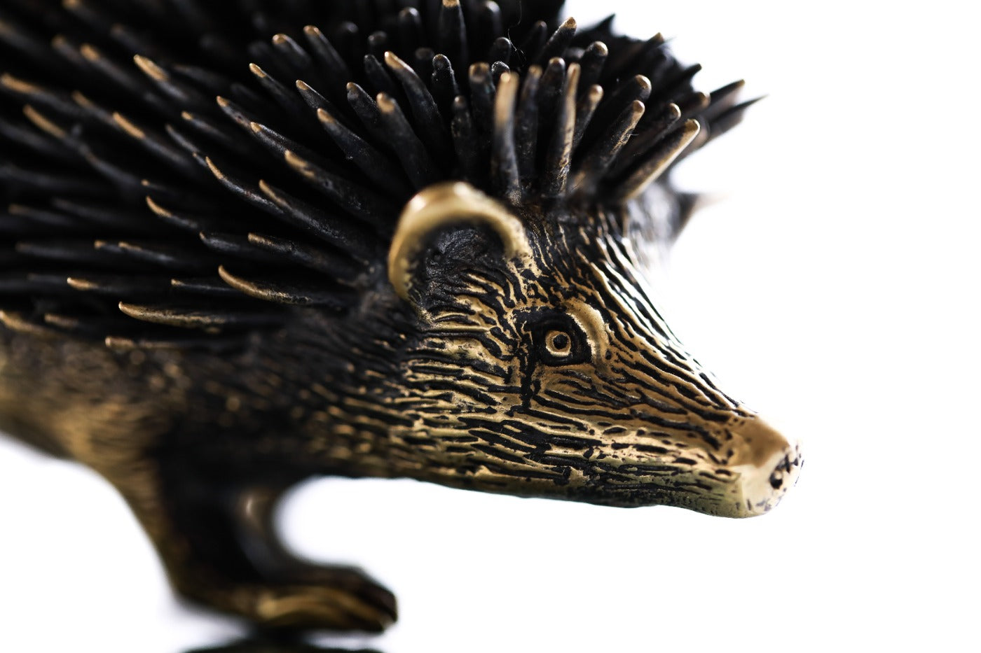 Bronze hedgehog sculpture — side view