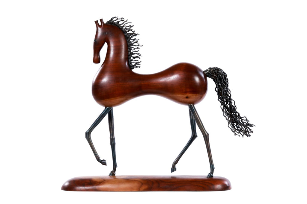 Hand-carved horse sculpture, reverse side view
