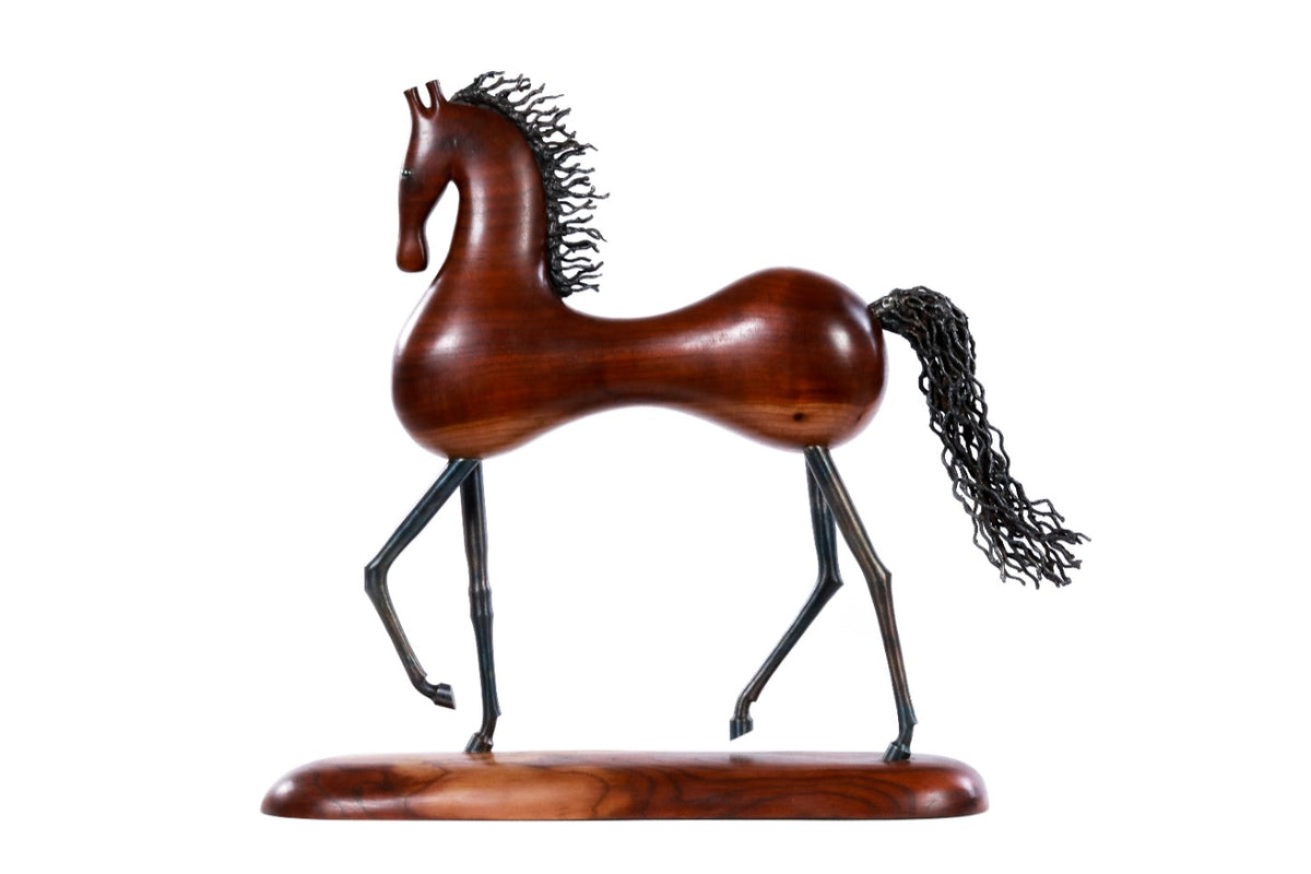 Hand-carved horse sculpture, reverse side view