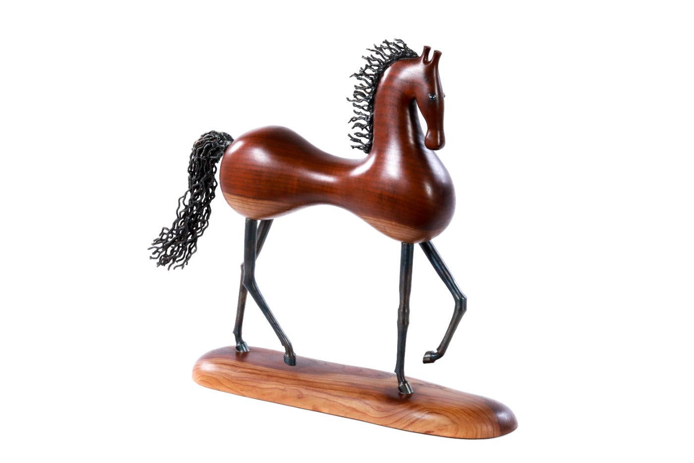 Wooden horse sculpture hand carved with metal pieces — detail view