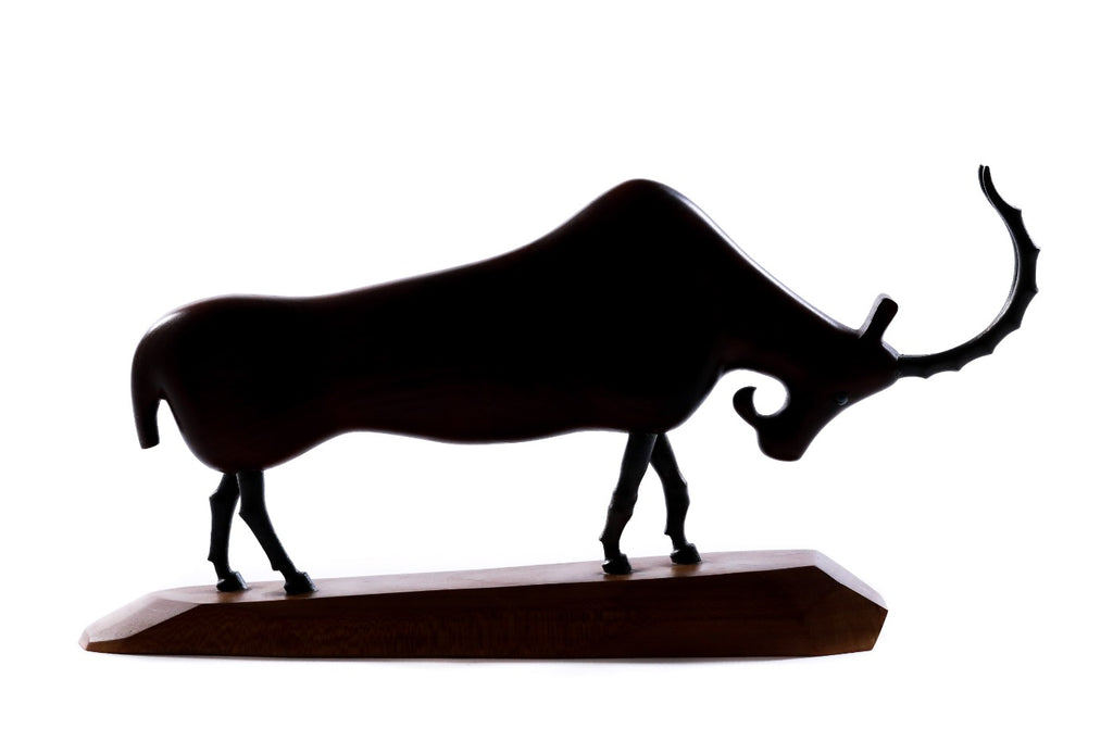 Hand-carved wooden goat sculpture, 11.4" / 29 cm — full view