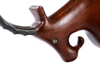 Wooden goat sculpture, natural apricot grain detail