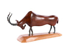 Handmade wooden goat sculpture — carving detail