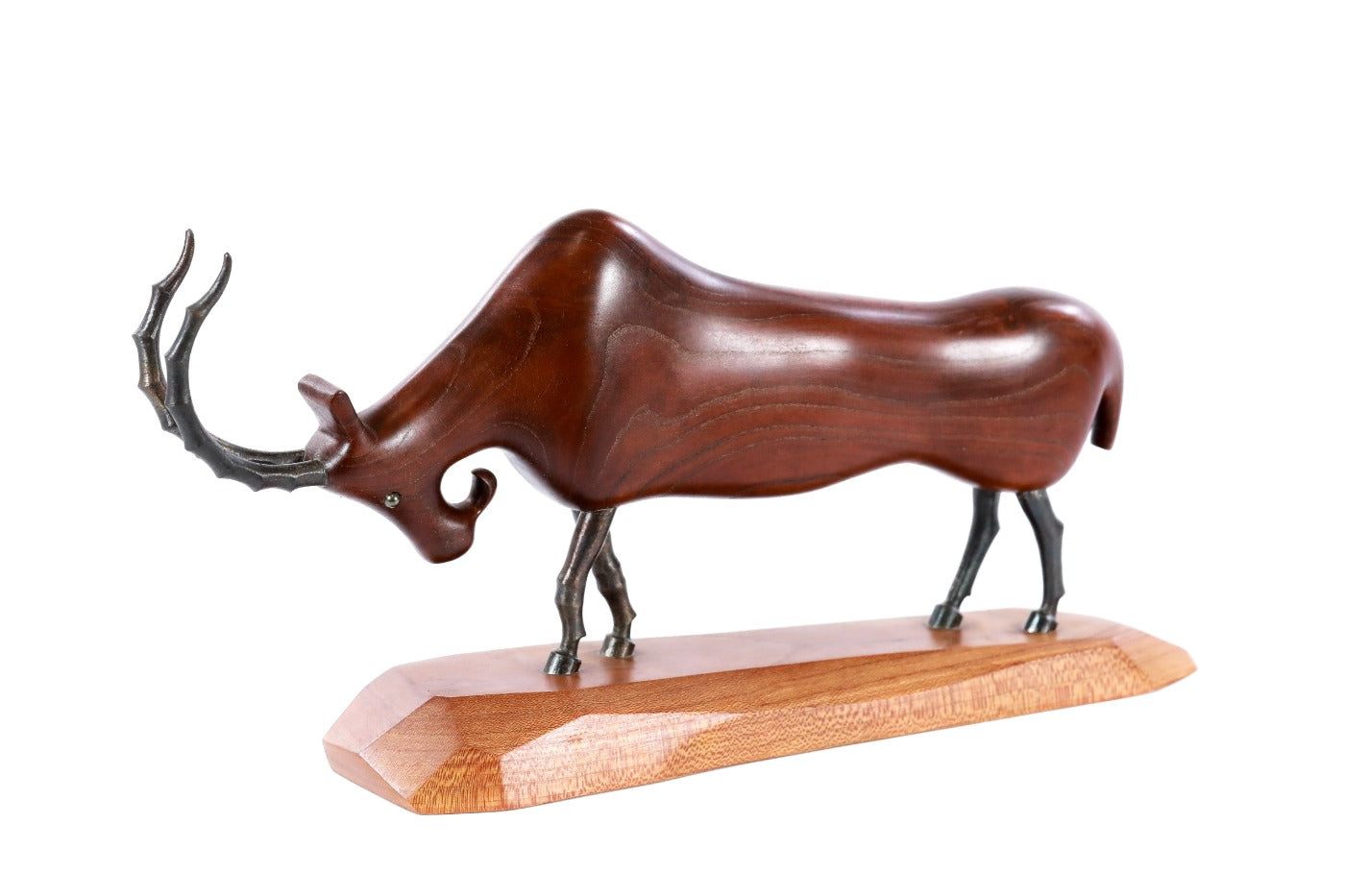 Handmade wooden goat sculpture — carving detail
