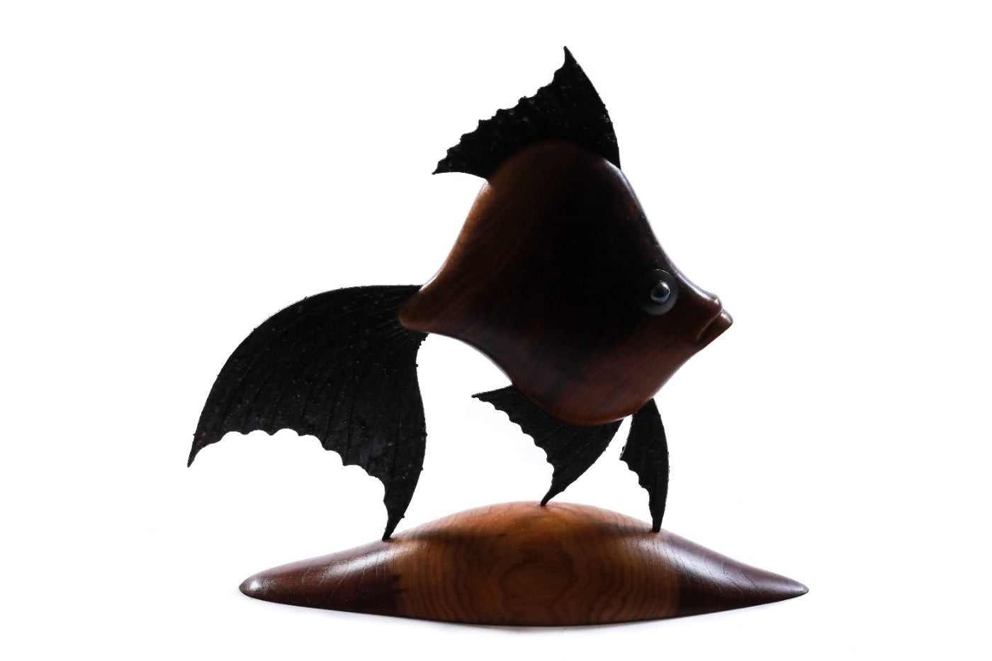 Wooden fish sculpture, natural apricot grain detail