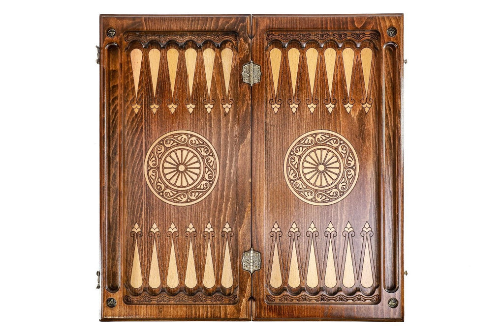 Backgammon field of the combo set laid flat, carved points and central wheel ornaments