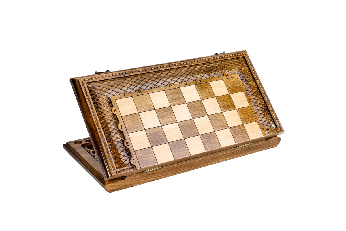 Closed 60 cm wooden chess board standing on edge, showing the carved lattice frame