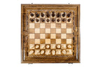 Top-down view of the carved lattice chess set with pieces in starting position