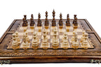 Front view of the luxury chess set with all 32 hand-carved pieces and carved coordinates on the border