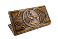 A frontal shot of the closed wooden backgammon board showcasing the detailed Scorpio scorpion engraving.