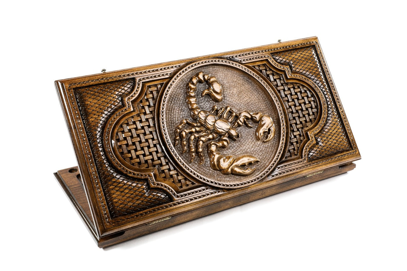 A frontal shot of the closed wooden backgammon board showcasing the detailed Scorpio scorpion engraving.