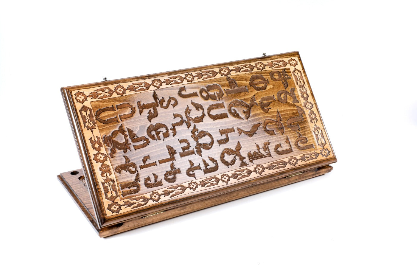 A frontal shot of the closed Armenian Alphabet backgammon board featuring high-relief hand-carved letters.