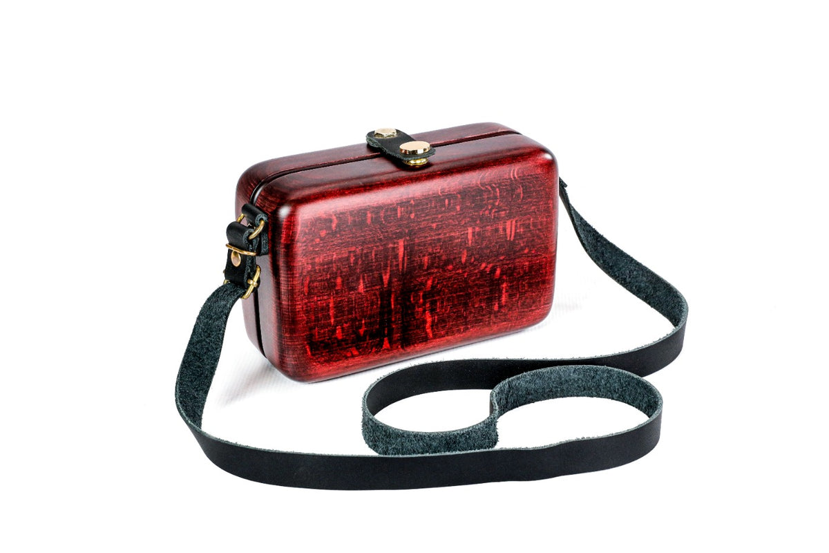 Rectangular wooden bag in burgundy — angle view
