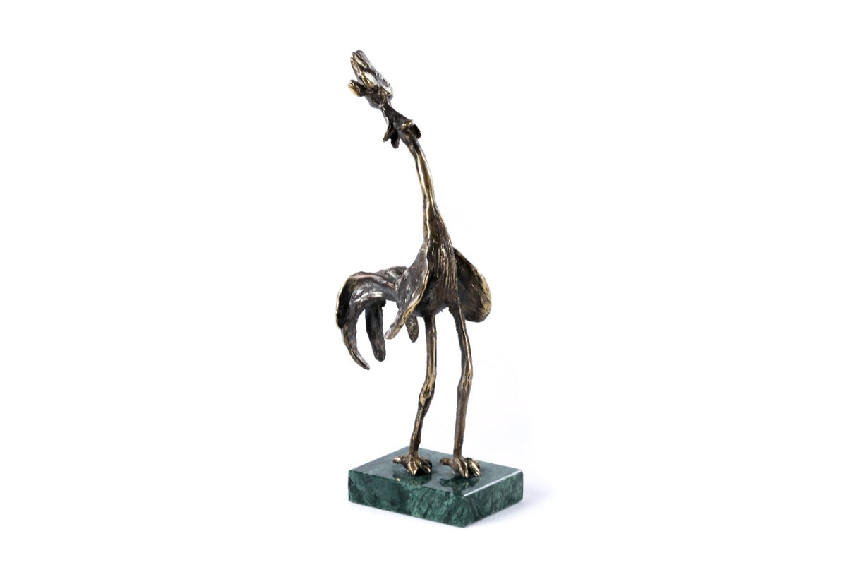 Bronze rooster sculpture — detail view