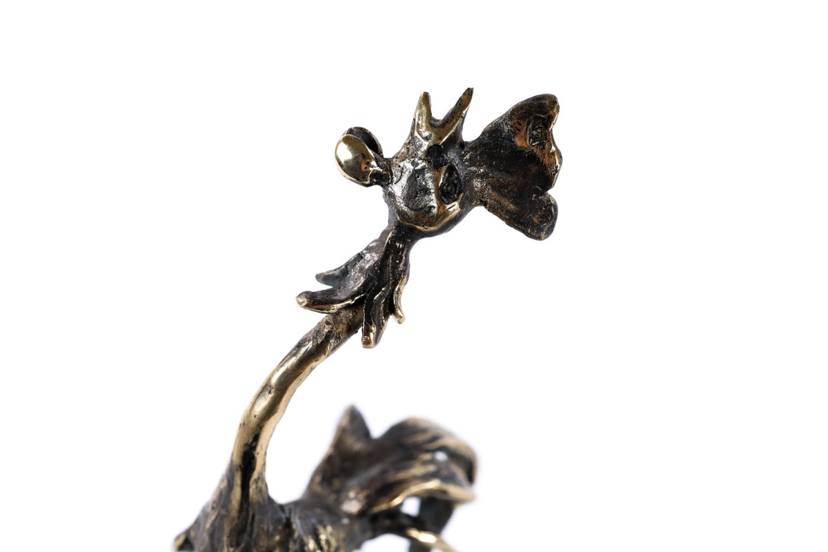Bronze rooster sculpture — side view