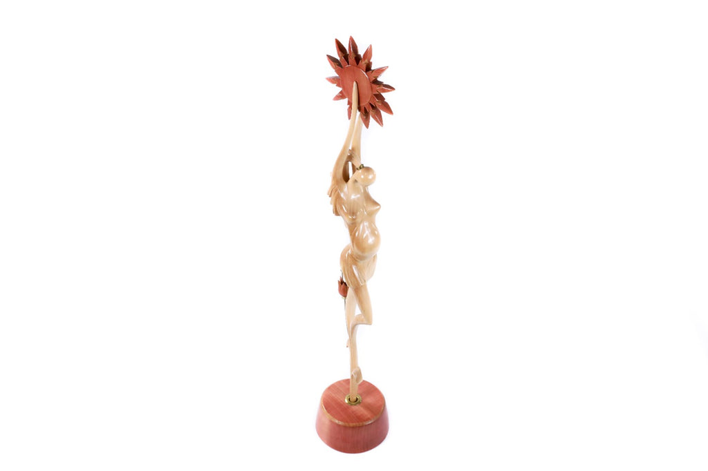 Wooden pregnant woman sculpture hand carved from linden wood — detail view