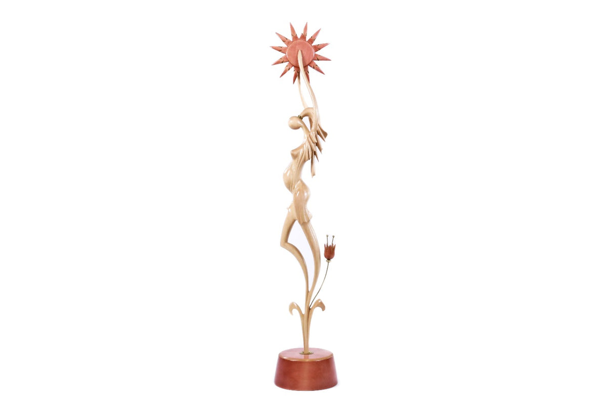 Handmade wooden motherhood sculpture — carving detail