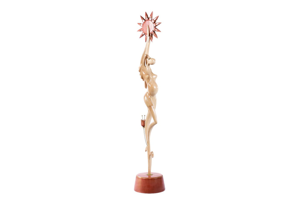 Hand-carved motherhood figure sculpture — back view