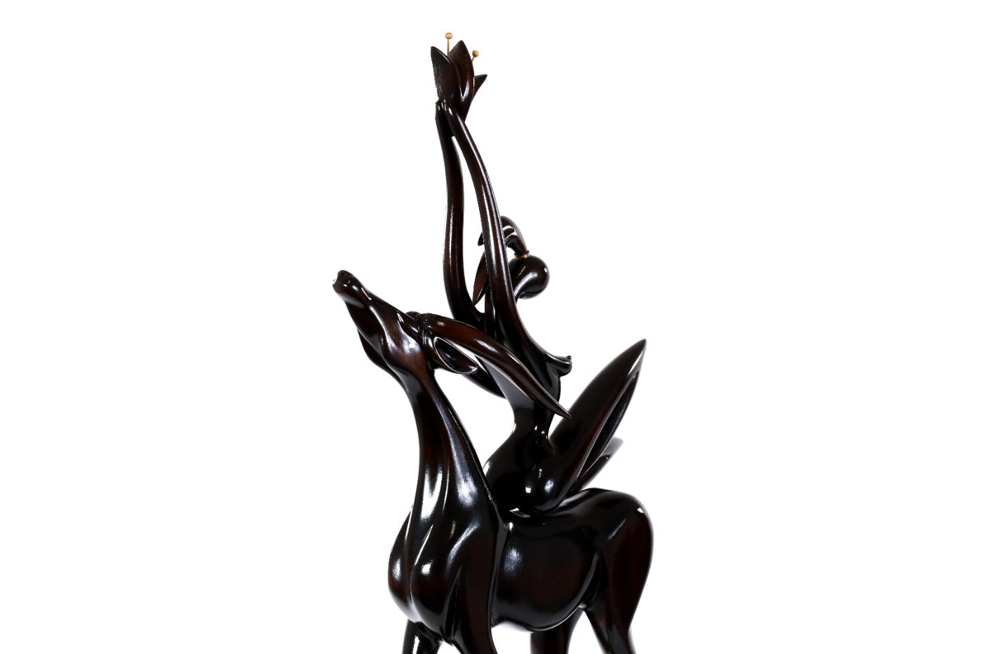 Handmade wooden figurative sculpture of a girl with antelope — carving detail