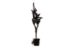 Wooden sculpture of a girl with an antelope — close-up