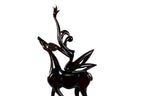 Girl with Antelope sculpture in carved wood — side view