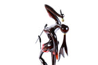 Singer sculpture in carved wood — side view