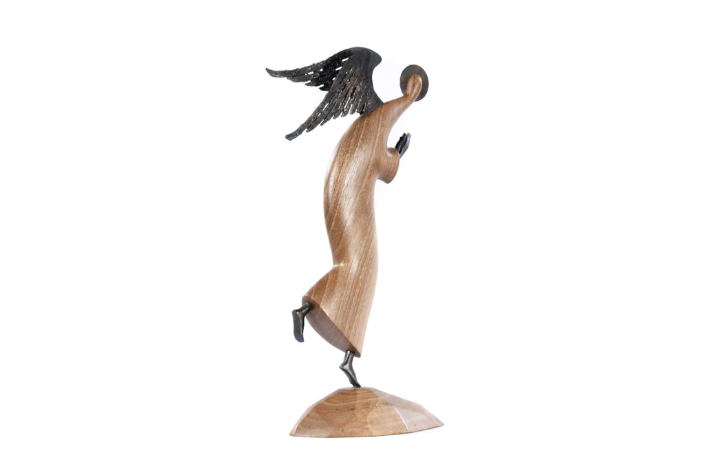 Handmade wooden angel sculpture — carving detail