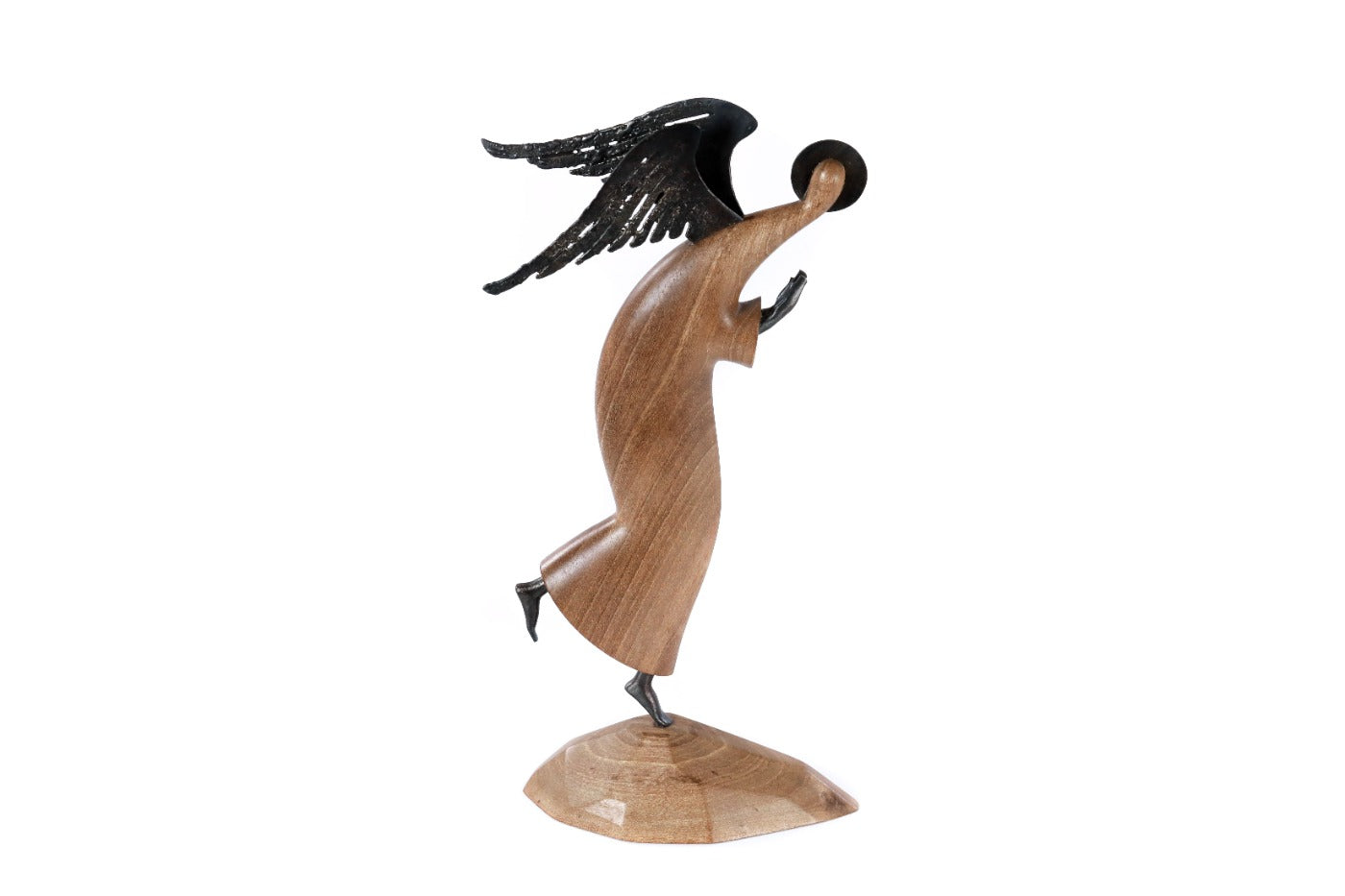Wooden angel sculpture with metal accents — close-up