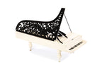 Handmade wooden piano scene sculpture — carving detail