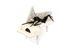 Lady of the Piano sculpture hand carved by Hrachya Ohanyan — angle view