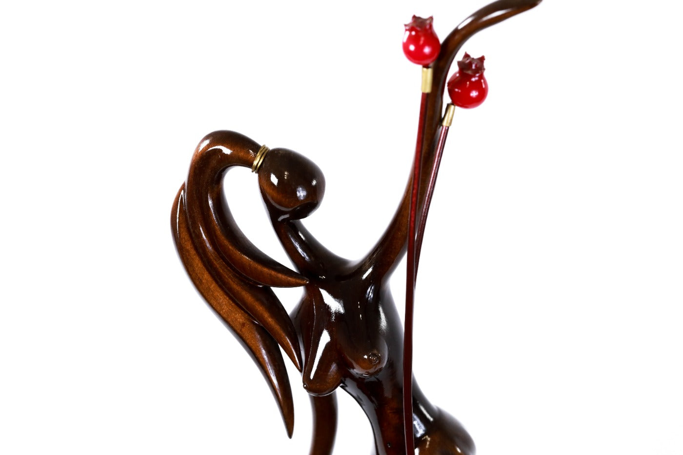 Hand-carved Armenian figure sculpture with pomegranates — back view
