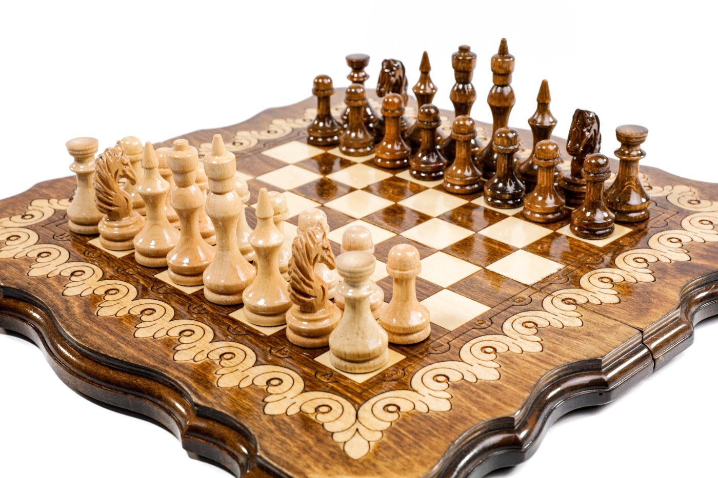 Handmade wooden chess board with decorative ornamental detailing