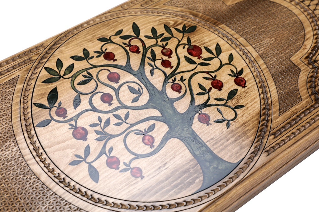 An angled view of the Hrachya Ohanyan board showing the glossy finish of the green resin against the natural solid wood.