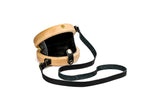 Natural wooden bag with black leather strap — side view