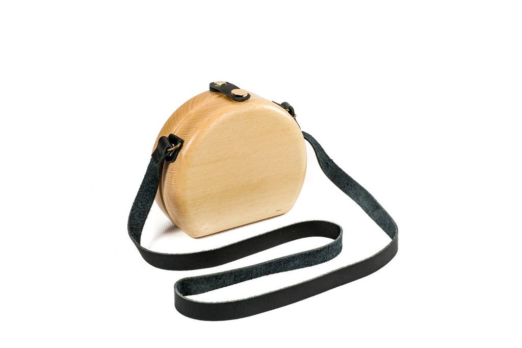 Handmade wooden handbag — grain close-up