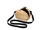 Round wooden bag in natural wood — angle view