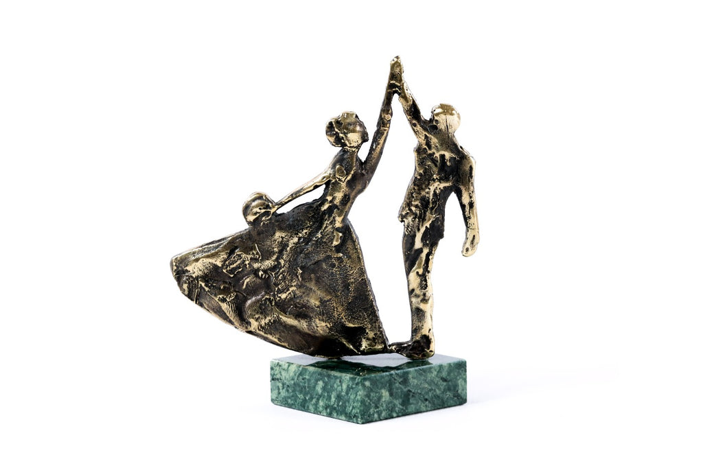 Handmade bronze dancing couple figurine — close-up