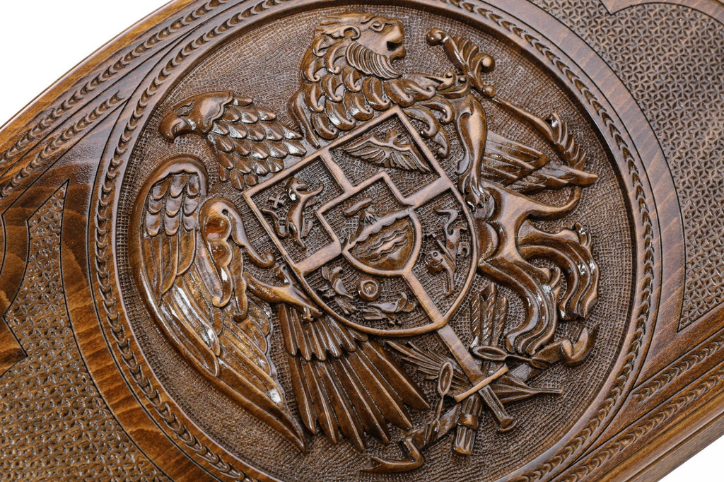 The reverse side of the board featuring the high-relief carving of the Russian Federation Double-Headed Eagle.